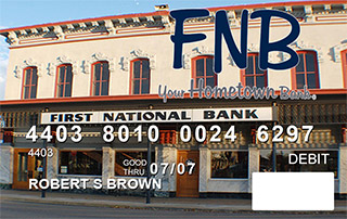 Credit card with modern photo of the First National Bank of Granbury as background